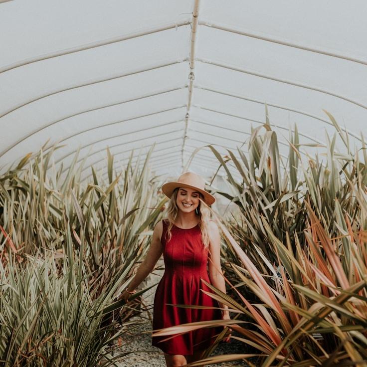 Kaveri Mehta, Lead Design Curator at Crypto Lumera, reviewing corporate floral arrangements